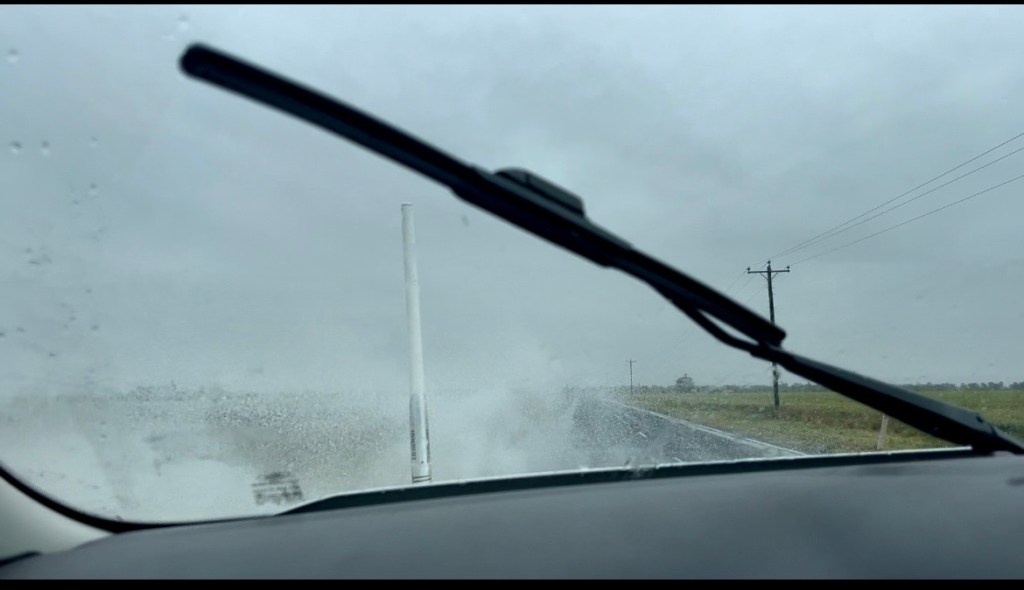 Water splashing over car